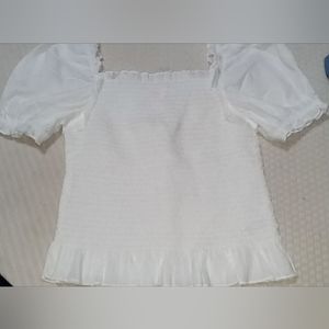 White ruffled shirt